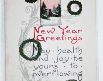 P-103: Vintage B. Bergman New Years Greetings Postcard With Divided Back and Postmarked