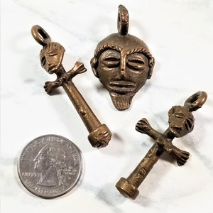 C-125; Three Bronze African Ashanti Tribal Charms One is a Mask and the Other Two are Fertility Figurines