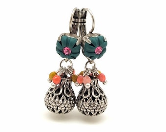 Earrings modeled in polymer clay enhanced with pearls