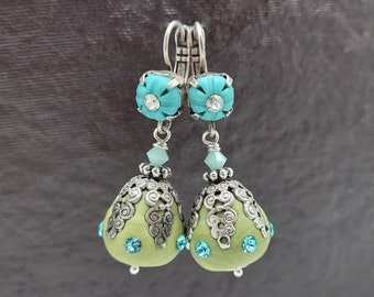 Earrings modeled in polymer clay enhanced with rhinestones