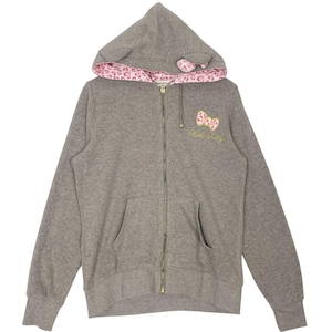 May include: Gray zip-up hoodie with a hood featuring cat ears and a pink leopard print lining. The front has a pink bow and the words "Hello Kitty" embroidered in gold. The hoodie has two front pockets.