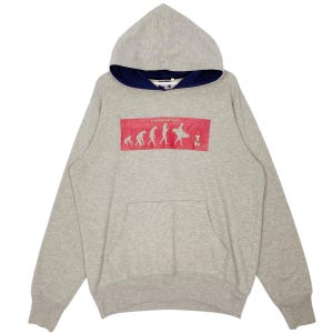 May include: A gray hoodie with a hood and a kangaroo pocket. The hood has a navy blue lining. A red rectangle on the front displays the text "Evolution Surf" and a graphic of human evolution ending with a surfer.