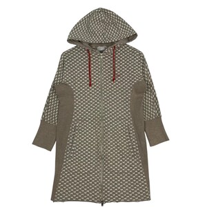 May include: A long-sleeve zip-up hoodie in a taupe and white repeating cat pattern. The garment features solid taupe side panels, long cuffs, and a hood with bright red drawstring cords. A full-length front zipper runs down the center.