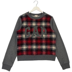May include: A grey sweatshirt with a red and white checked pattern on the front. The word "GAP" is printed in grey on the checked pattern.