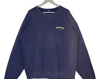 Vintage 90-tals Nike-tröja, solblekt marinblå, broderad logotyp, storlek L