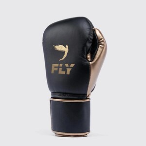 Fly boxing gloves made from premium genuine leather, designed for professional sparring and training sessions. The gloves feature thick multi-layer foam padding for impact protection, secure wrist support with Velcro or lace-up closure, and a comfortable inner lining for extended workouts. Ideal for boxing, bag work, and gym training, offering durability, performance, and a sleek professional fight-style design for men and women athletes.