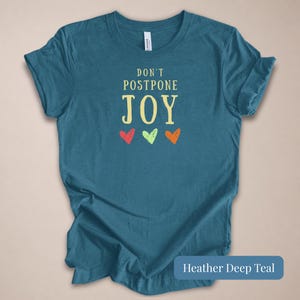 Meaningful Gift Women Inspirational Tee Positive Message Motivational Quote Shirt Dont Postpone Joy Graphic Design Mental Health Awareness Top Happy Vibes Joyful Apparel Uplifting Message Casual Comfort Style Daily Wear Wellness Support