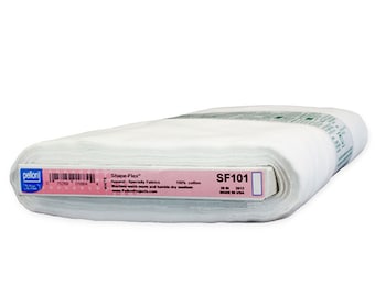 May include: A roll of white Shape-Flex fabric, labeled SF101, made of 100% cotton. The label includes the brand name Pellon and details about the fabric's use in apparel. The roll measures 20 inches wide.