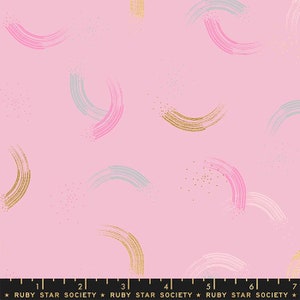 May include: Pink fabric with a repeating pattern of gold, pink, and blue brushstrokes in the shape of arcs. The background is a light pink color.