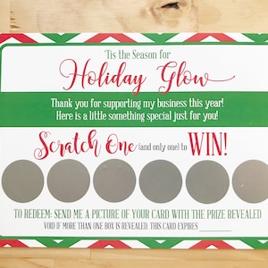 May include: A red, white, and green Christmas-themed scratch-off card with the text "'Tis the Season for Holiday Glow" and "Scratch One (and only one!) to WIN!"  To redeem, send a picture of the card with the prize revealed. Void if more than one box is revealed. This card expires.