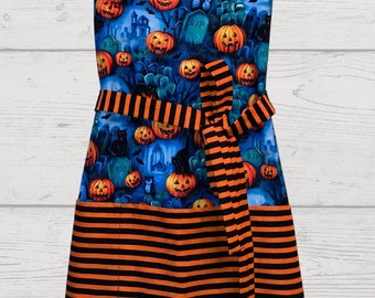 Spooky Pumpkin Patch Halloween Apron with Graveyard Vibes - Orange & Black Striped Pockets