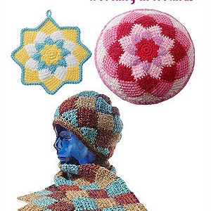 May include: A crochet pattern book titled "Adventures in Entrelac: Working in Rounds". The cover features three crocheted items: a yellow, white, and blue star, a pink and red round, and a brown, blue, and red hat and scarf set.