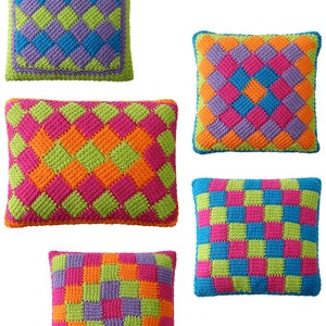 May include: Five colorful crocheted pillow covers with geometric patterns in shades of green, orange, pink, blue, and purple.