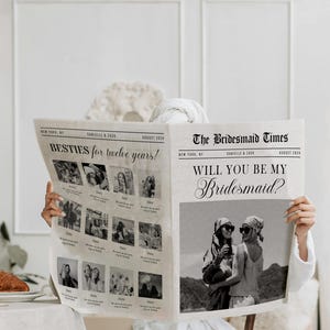 May include: A black and white newspaper titled "The Bridesmaid Times" with the headline "Will You Be My Bridesmaid?" and the text "Besties for twelve years!". The newspaper features photos and is held by a person.