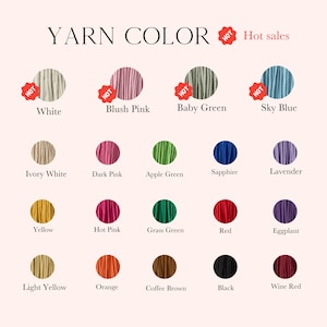 Peut inclure: Un nuancier de fils pr&eacute;sentant diverses couleurs, notamment blanc, rose blush, vert b&eacute;b&eacute; et bleu ciel. D'autres couleurs incluent ivoire, rose fonc&eacute;, vert pomme, saphir, lavande, jaune, rose vif, vert herbe, rouge, aubergine, jaune clair, orange, brun caf&eacute;, noir et bordeaux.