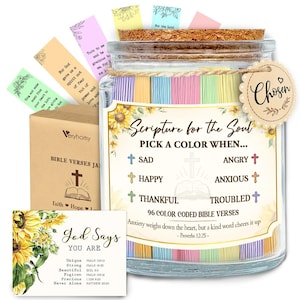 May include: A glass jar with a cork lid contains colorful Bible verses. The jar is labeled "Scripture for the Soul" and includes a tag that says "Chosen." Additional items include a card with sunflowers and the text "God Says You Are," and a small box with the text "Bible Verses Jar."