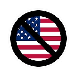 May include: A round sticker featuring the American flag with a black diagonal line through it, inside a black circle. The flag has red and white stripes and a blue field with white stars.