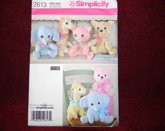 May include: Simplicity sewing pattern number 2613 for making stuffed animals. The pattern includes instructions for making a giraffe, elephant, pig, cat, and a bunny. The pattern is for one size.