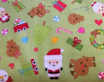Santa Express Cotton Flannel Fabric in Green