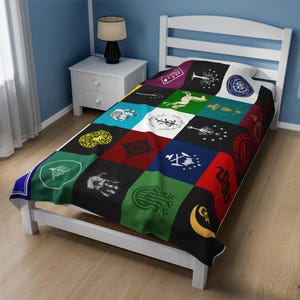 Lord of the rings middle earth Fantasy flags and symbols patchwork duvet cover on twin bed, magical emblems and mythical symbols design in colorful squares, bedroom decor with white furniture and blue walls, geek bedroom decor