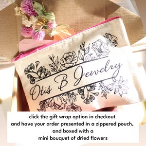 a picture of a gift bag with a name on it