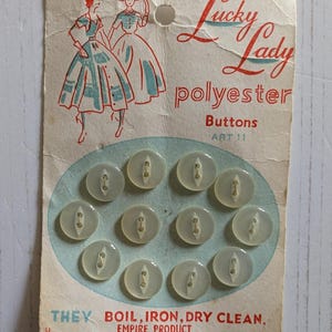 Echte vintage witte Lucky Lady-knopen x 12,7 cm doorsnee