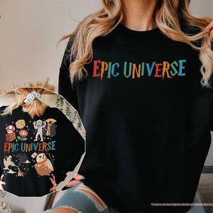 May include: Black sweatshirt with the text "EPIC UNIVERSE" in colorful letters across the chest. The back of the sweatshirt features a graphic with various cartoon characters and the words "EPIC UNIVERSE".