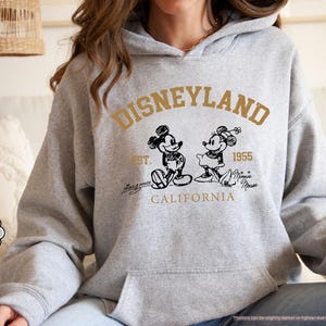 May include: A trio of ceramic mugs with a speckled, matte finish in light blue, cream, and grey. The mugs have a simple, modern design and a comfortable handle. Ideal for tea or coffee.