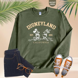 May include: A rustic wooden sign with the text "Welcome to our home" in white lettering. The sign has a distressed finish and a simple, inviting design, suitable for a front porch or entryway.