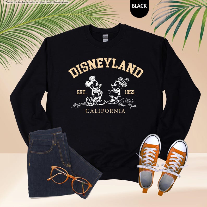 May include: A trio of cream-glazed ceramic mugs, each adorned with a hand-painted floral pattern in blue, green, and yellow. The mugs have a speckled finish and a classic, rounded design with a handle. Ideal for tea or coffee.