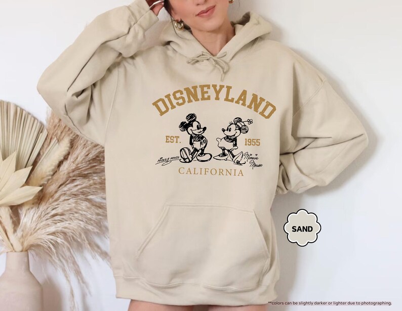 May include: A set of three ceramic mugs with a speckled, matte finish in cream, light grey, and dark grey. Each mug has a simple, minimalist design, ideal for coffee or tea.