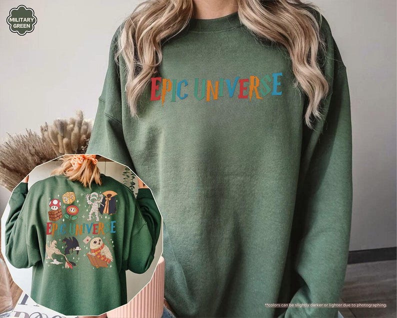 May include: A military green sweatshirt with the text "EPIC UNIVERSE" in colorful letters across the chest. The back of the sweatshirt features various cartoon characters and the same text. The sweatshirt is made of a soft material.