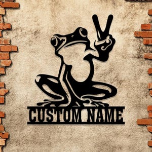 Custom Frog Peace Metal Sign: LED-lit frog wall art, perfect for lake houses and gardens. Personalized with names, ideal for unique gift.