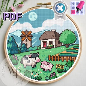 May include: A cross-stitch pattern featuring a pixelated farm scene with a house, windmill, and rolling hills under a blue sky with a moon. Includes a cow, pig, and the text "PDF". The design is framed in a wooden hoop.