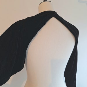 velvet bolero sample lined with Haider Ackermann woven crosses open back front closure  black & belted light padding also made on demand