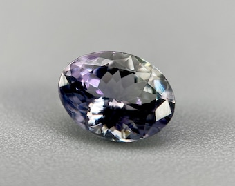 Natural Unheated Peacock Tanzanite Gemstone: 1.21 ct Untreated Oval Cut