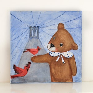 May include: A whimsical painting of a brown bear with a blue and white polka-dot collar, interacting with two red cardinals. The background features a bridge and blue lines, creating a charming and imaginative scene.