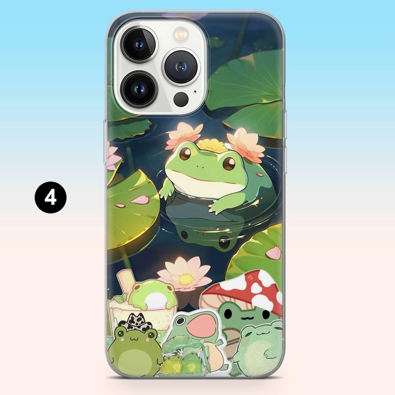 May include: Clear phone case featuring a whimsical frog pond design. The case showcases a large green frog with flower accents, lily pads, and smaller frog illustrations. The background has a blue and green gradient.