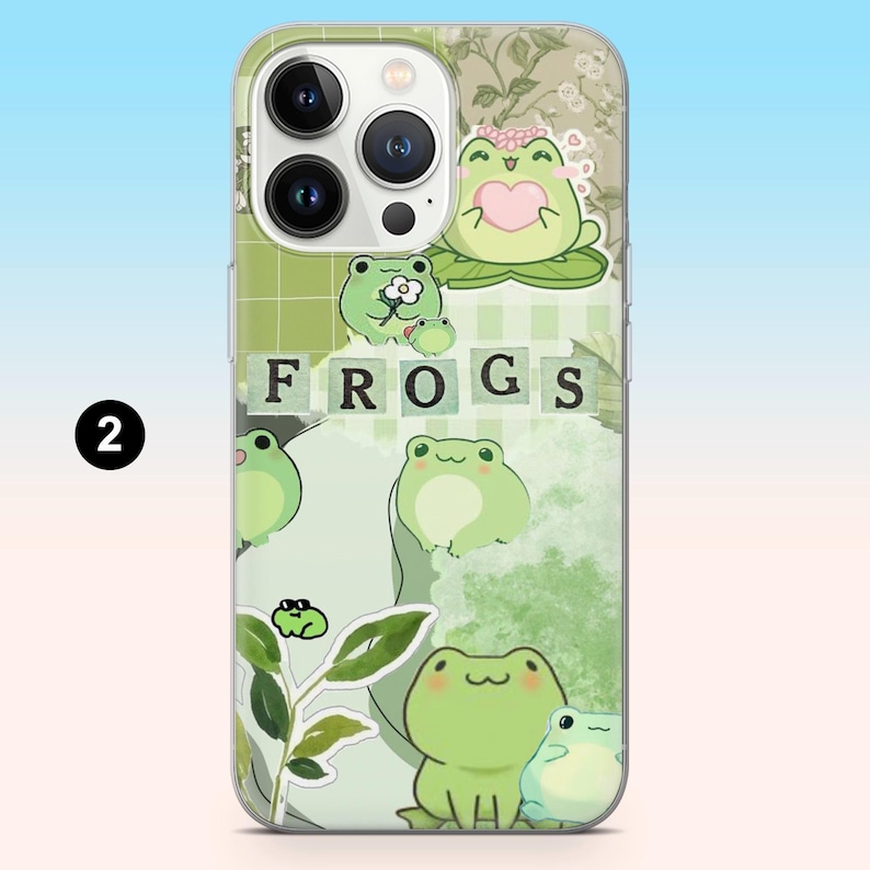 May include: A clear phone case featuring a design with multiple cartoon frogs in various poses. The word "FROGS" is displayed in block letters. The background has a green grid pattern and floral accents.