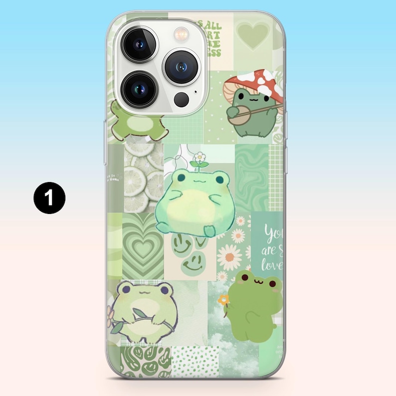 May include: A phone case with a collage of green and white squares. The design features cartoon frogs, hearts, daisies, and the words "You are so loved." The case has a clear border and a camera cutout.