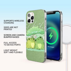 May include: A phone case with a green frog design. The case features two cartoon frogs under a leaf, with the text "SUPPORTS WIRELESS CHARGING", "SIDES ARE NOT PRINTED", "SCREEN AND CAMERA BUMPER RAISED", "FULL ACCESS TO DEVICE PORTS", and "LIGHT WEIGHT SOFT AND FLEXIBLE".