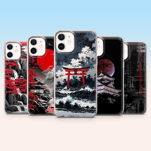May include: Several phone cases with Japanese art. The designs include a red torii gate, a red sun, and traditional buildings. The cases have a clear border and a blue gradient background.