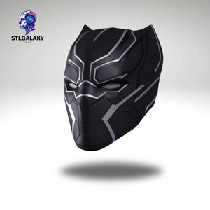 May include: Black plastic mask with a silver design. The mask has a pointed chin and a raised brow.