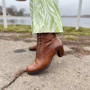 vintage women's leather boots with a small heel