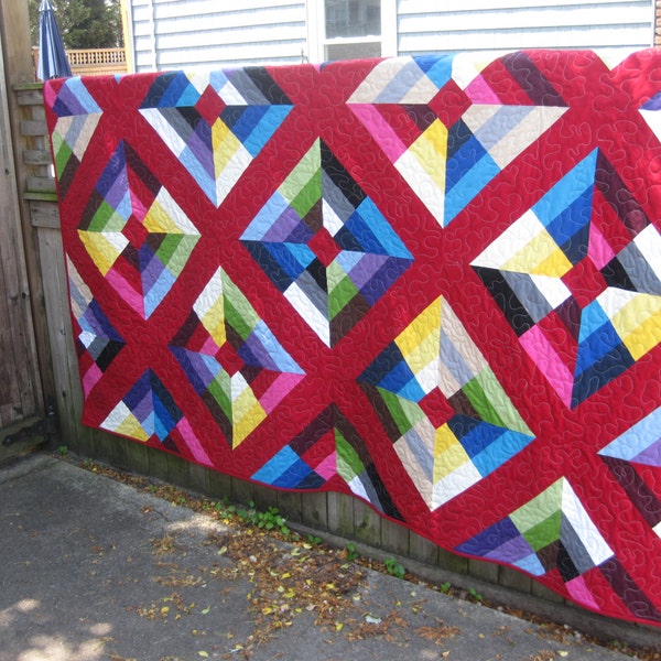 Modern red quilt geometric bright color solids kite flight large quilt blanket