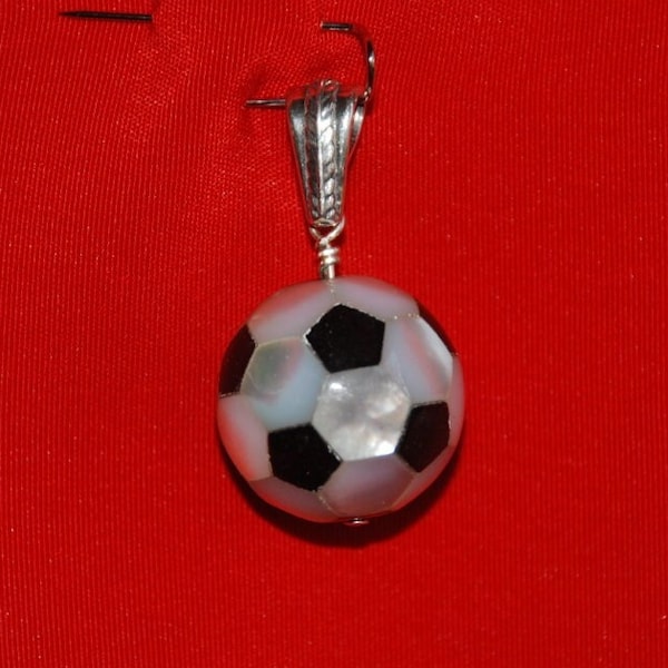 Black onyx and mother of pearl soccer ball pendant