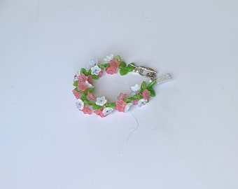 Pulseira Garden 21 em rosa e branco com folhas verdes e fecho em prata de lei