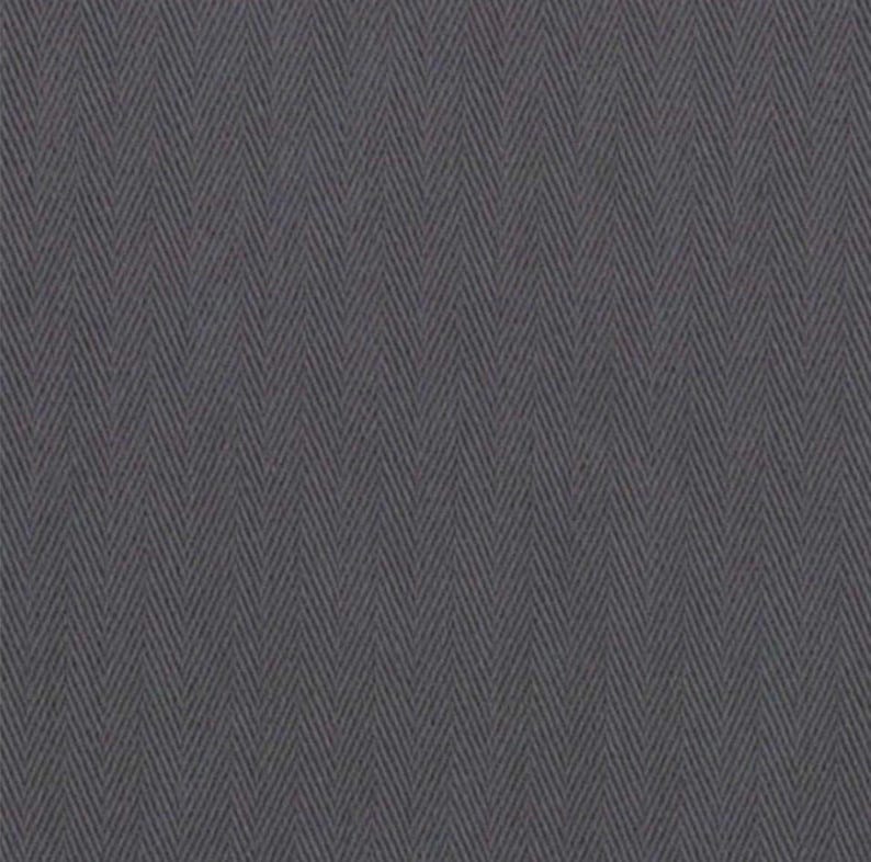 May include: A close-up of a gray fabric with a herringbone pattern. The fabric has a textured appearance with diagonal lines creating a V-shaped design. The color is a muted gray, with subtle variations in tone.