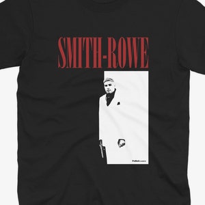 May include: Black t-shirt with a red "SMITH-ROWE" text and a black and white image of a man in a white suit.