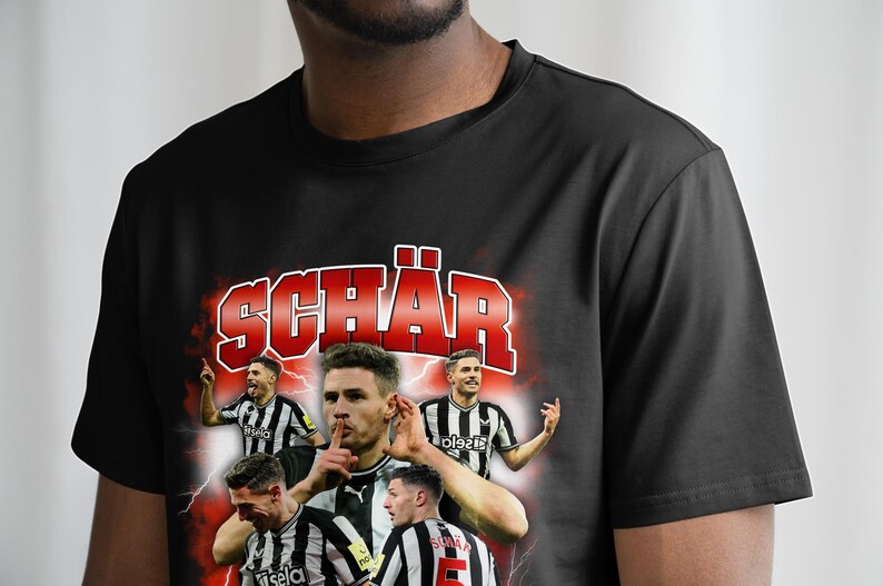 May include: Black t-shirt featuring a red and white graphic print of a football player with the name "SCH&Auml;R" in large red letters.